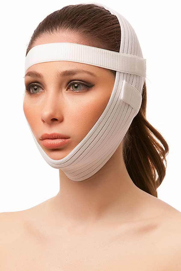 compression garment secured with a strap.